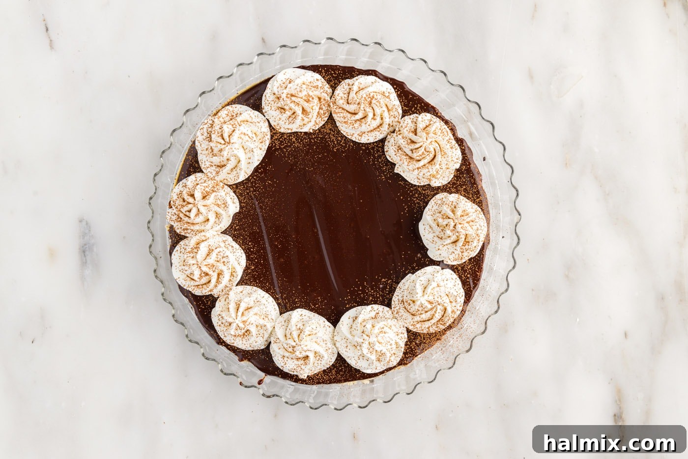 Baileys Irish cream cheesecake with ganache and whipped cream