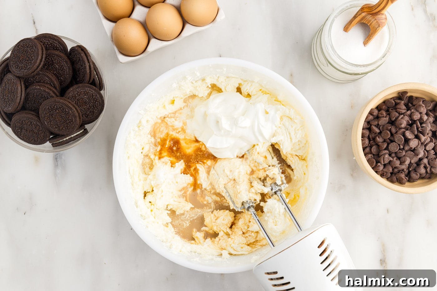 cheesecake ingredients in a mixing bowl