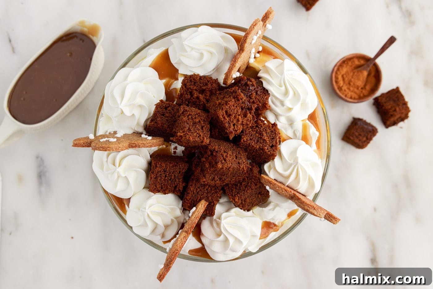 Beautifully garnished Gingerbread Trifle with gingerbread men cookies and cinnamon dusting