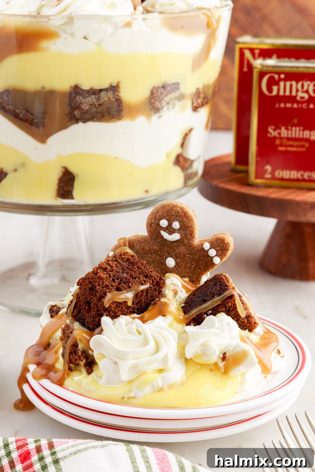 A slice of Gingerbread Trifle presented elegantly on a white plate