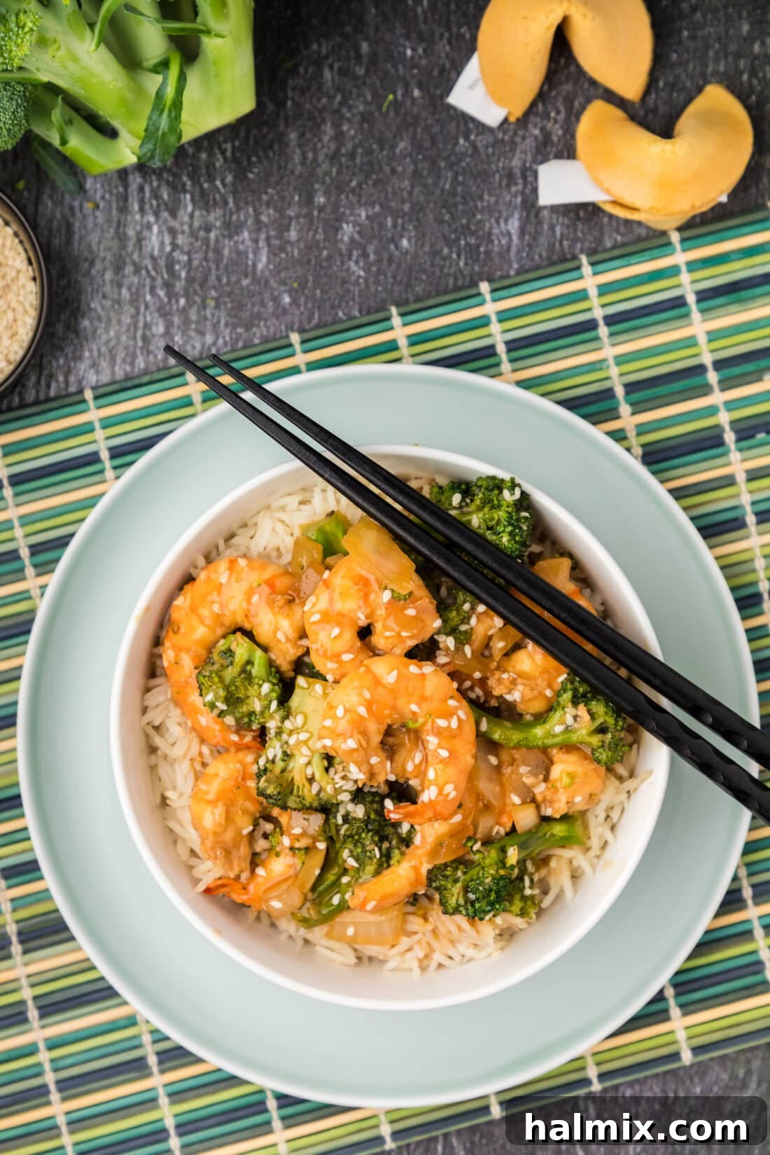 Bowl of Shrimp and Broccoli with chopsticks on the side