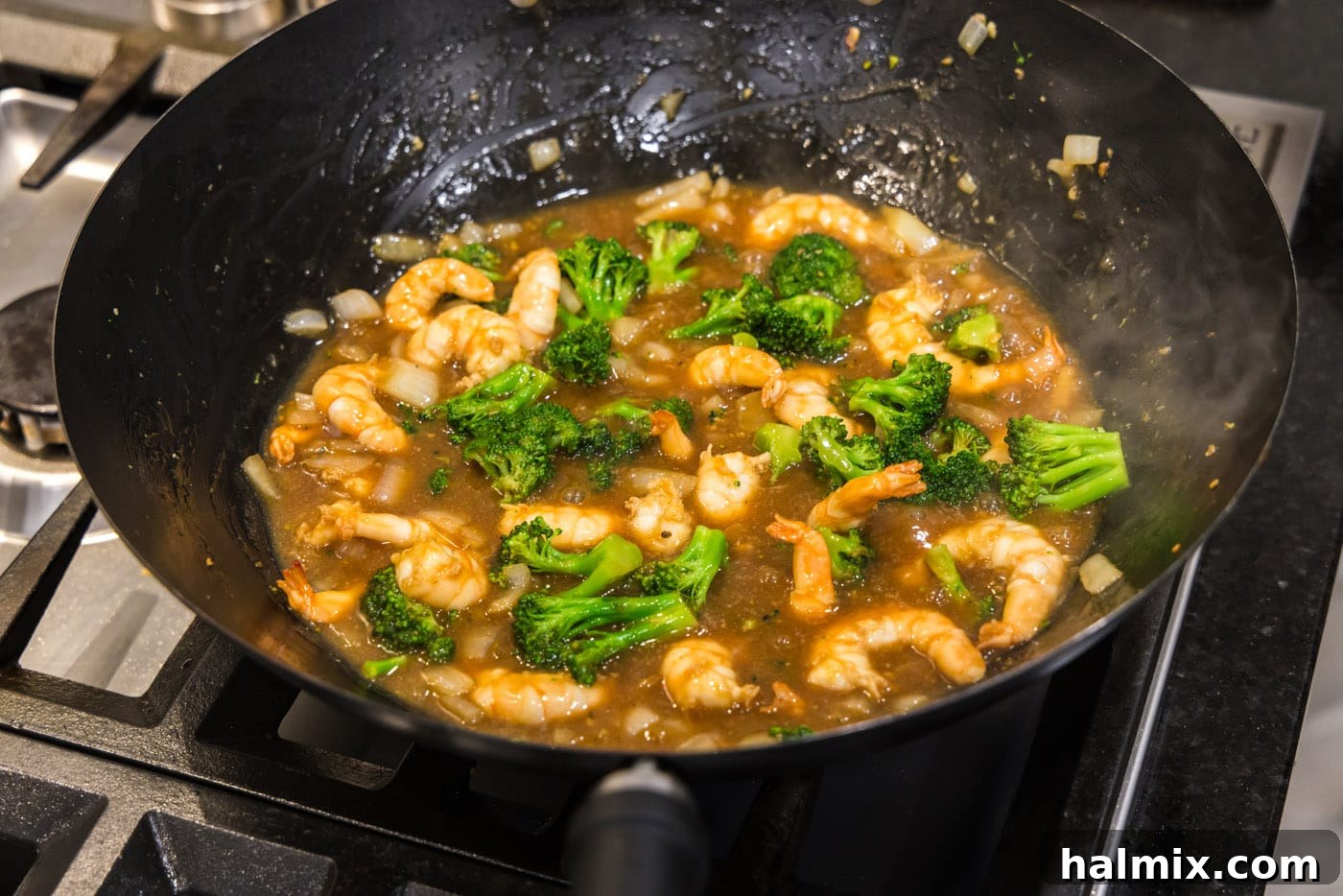 shrimp and broccoli in a wok