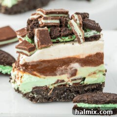 Close up photo of a Mint Chocolate Dream Bar on a plate, ready to be enjoyed.