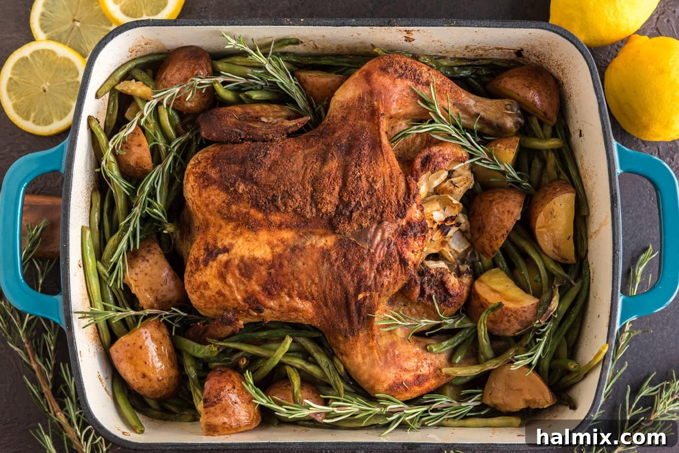 Irresistibly Sticky Slow Roasted Chicken 11 slow roasted sticky chicken overhead in a pan with green beans and potatoes