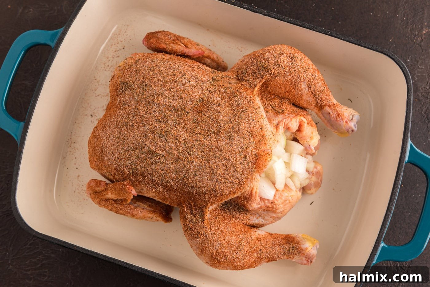 Irresistibly Sticky Slow Roasted Chicken 6 whole chicken rubbed with seasonings and stuffed with onions