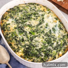 Close up photo of a Spinach Souffle, beautifully golden and puffed.