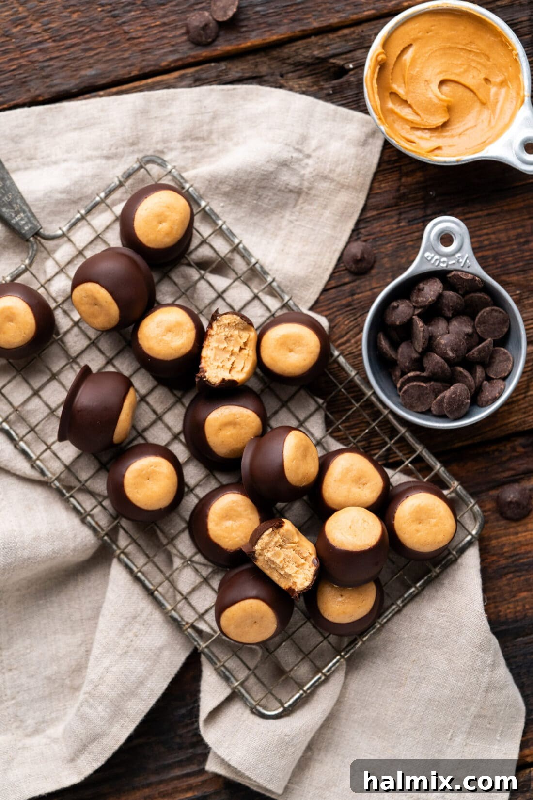 Buckeye Candy on a cooling rack, perfectly dipped in chocolate