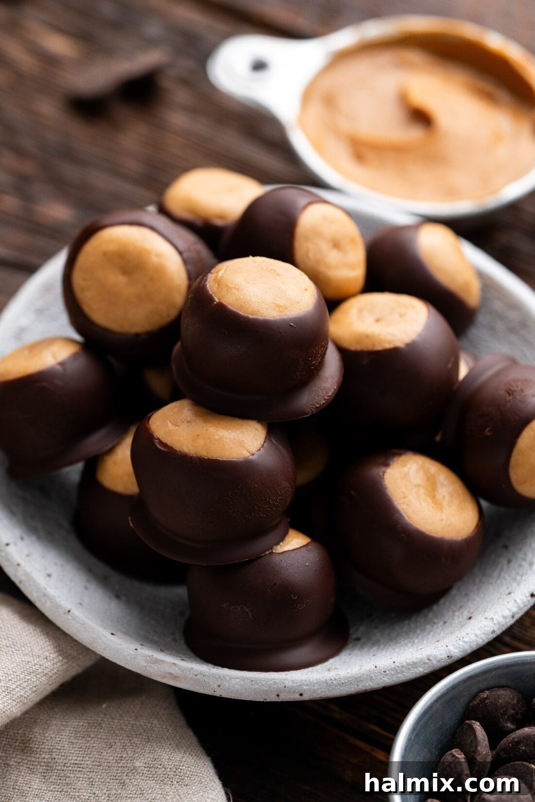 Close up photo of Buckeye Candy in a bowl, showing the peanut butter center
