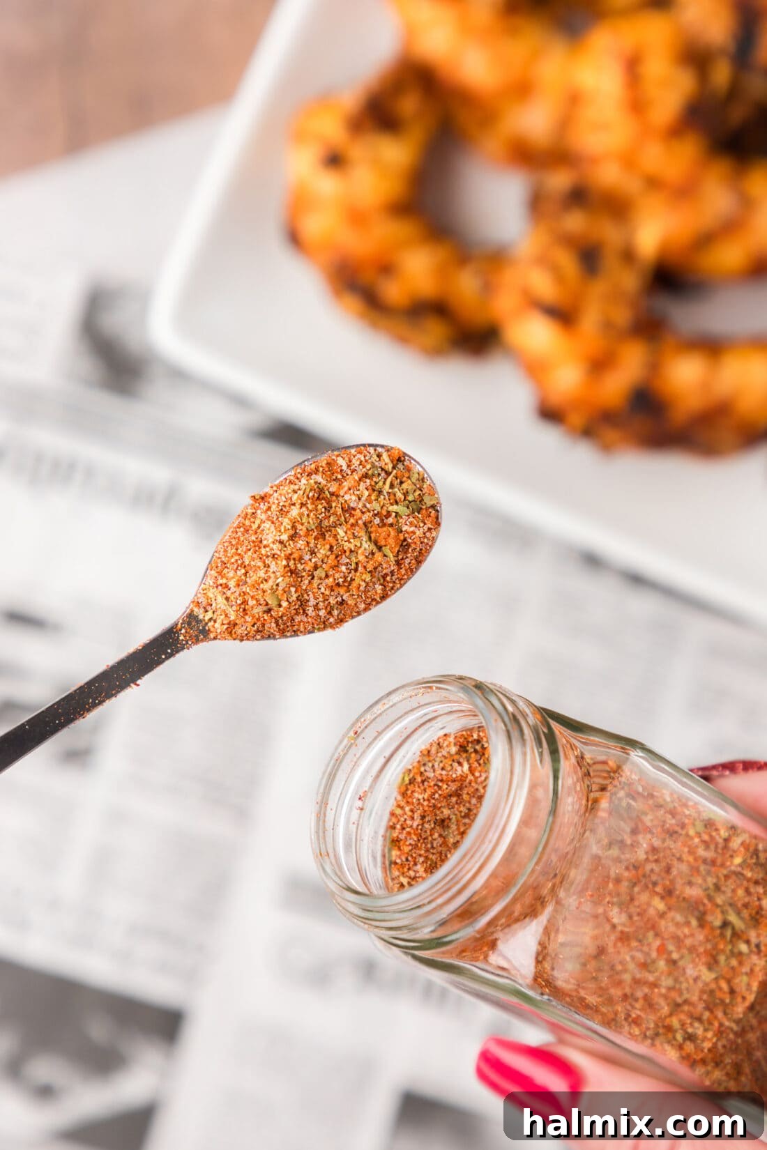 Spoonful of Shrimp Seasoning in a kitchen setting