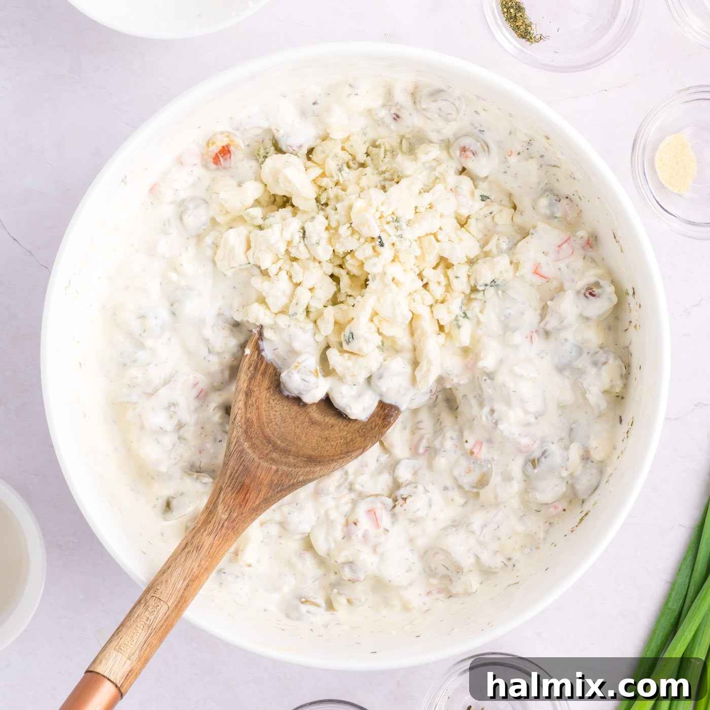 blue cheese crumbles added to martini dip