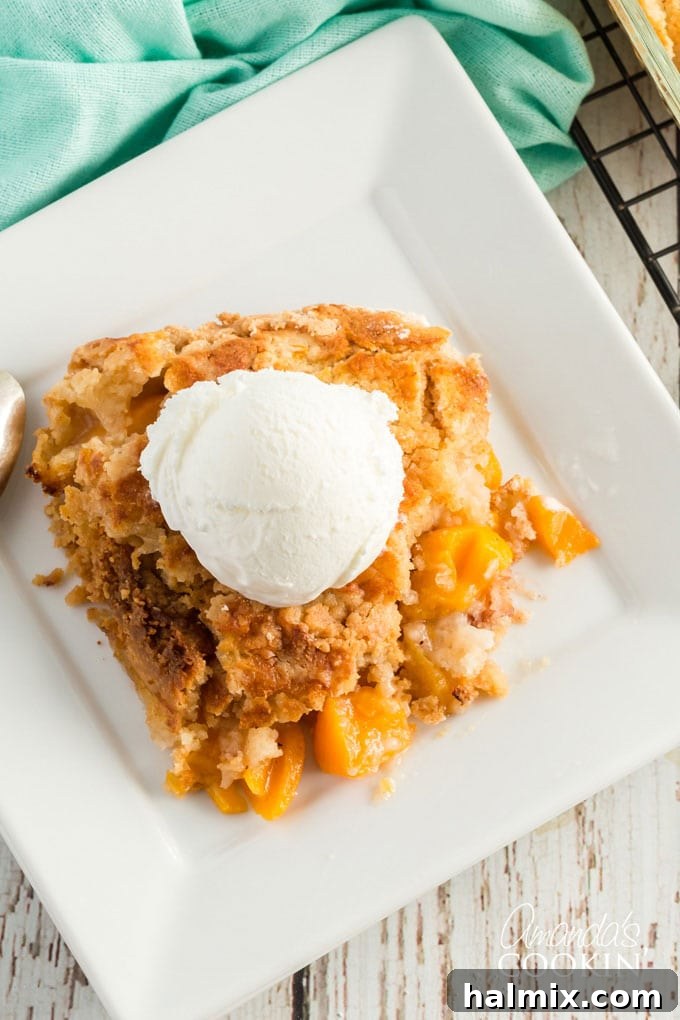overhead view of peach dump cake with ice cream