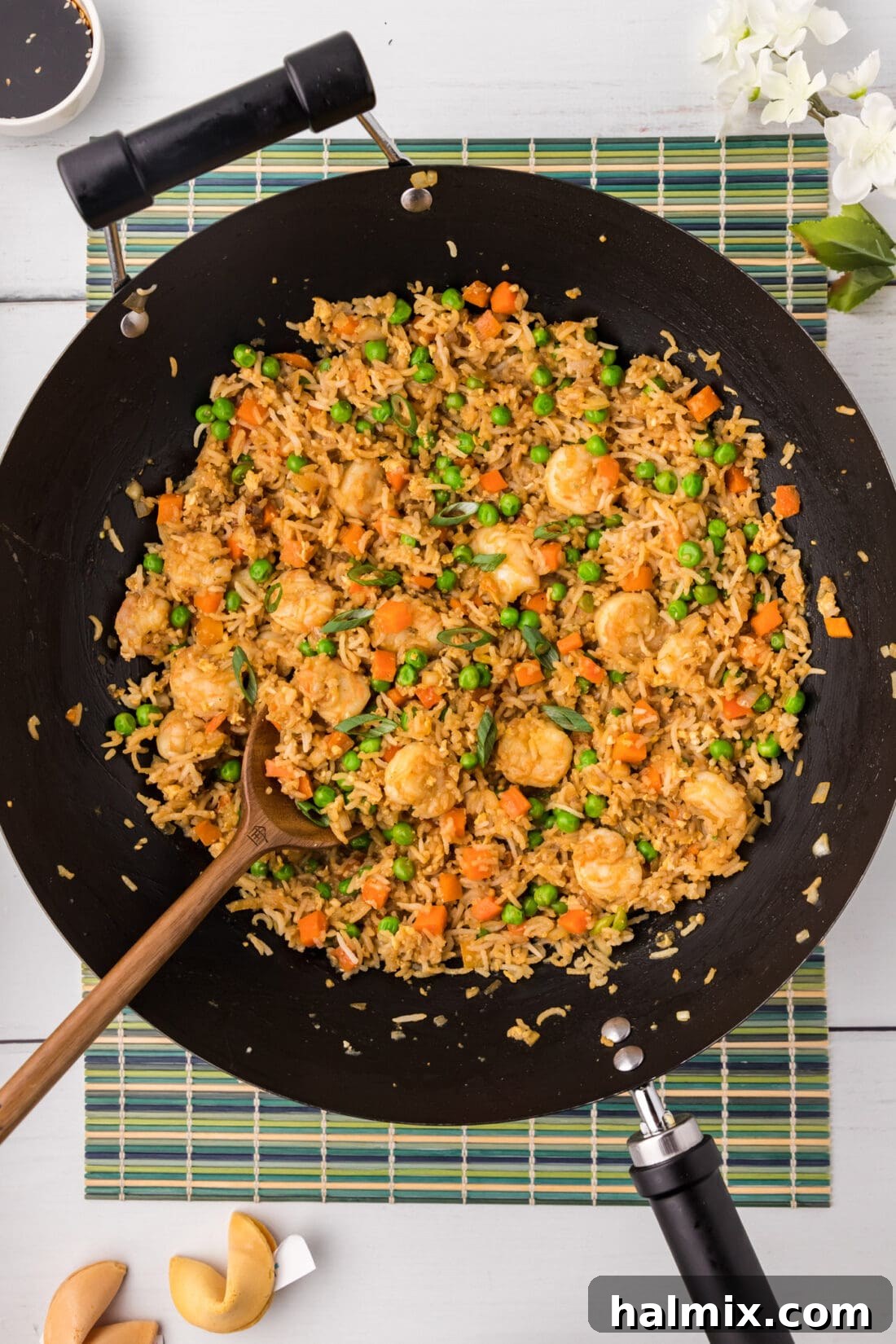 Shrimp Fried Rice in a wok with a spoon