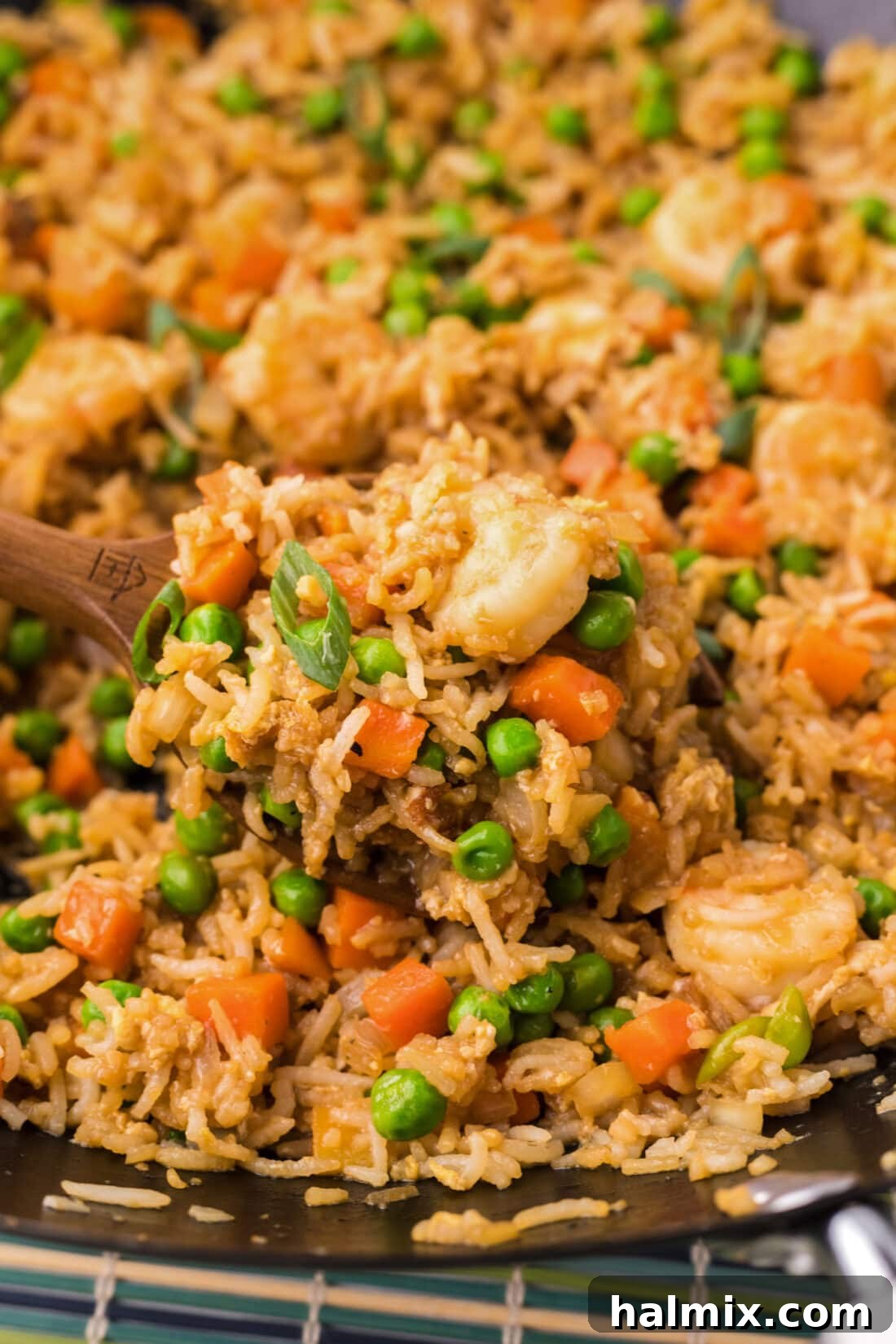 Close up photo of a spoonful of Shrimp Fried Rice