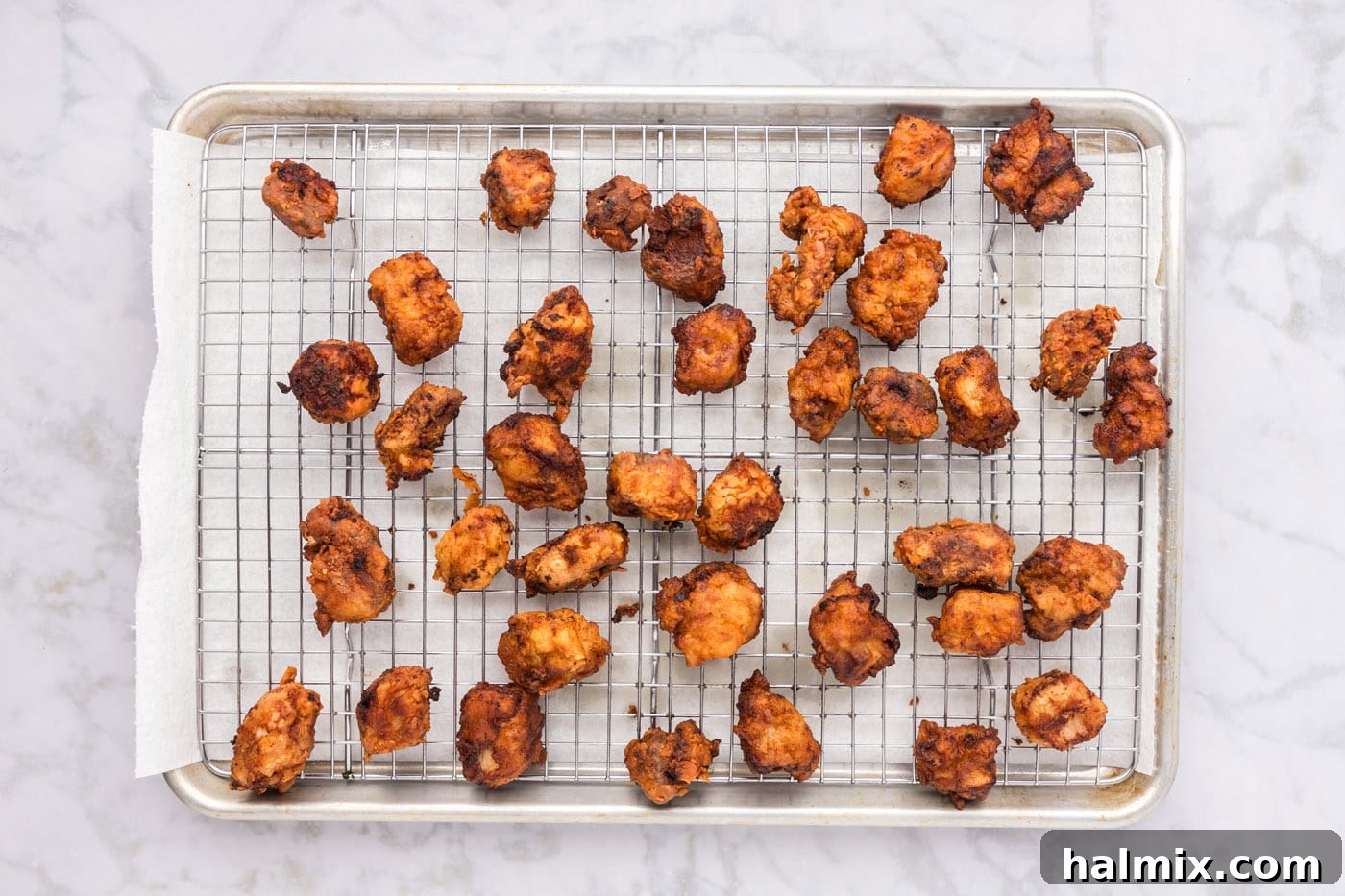 Golden Fried Pork with Tangy Glaze 13 crispy fried pork on a wire cooling rack