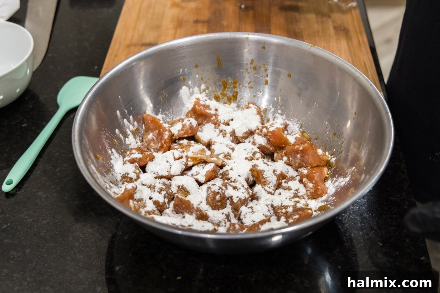 Golden Fried Pork with Tangy Glaze 8 pork cubes with flour sprinkled on top