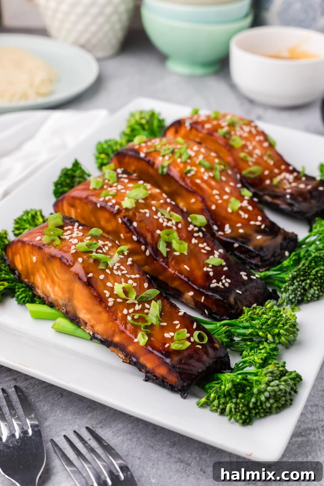 A perfectly baked Miso Salmon fillet, glistening with glaze, presented on a elegant platter, ready to be served.