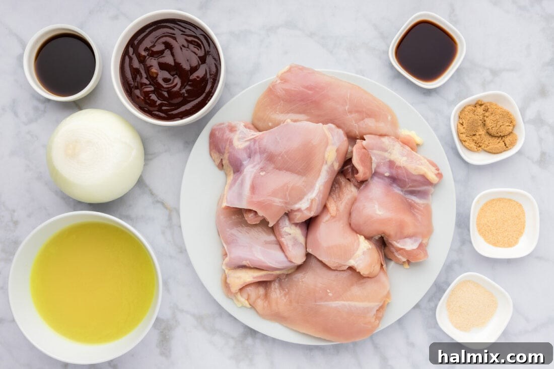 A collection of fresh ingredients laid out on a counter, prepared for making Instant Pot BBQ Chicken.