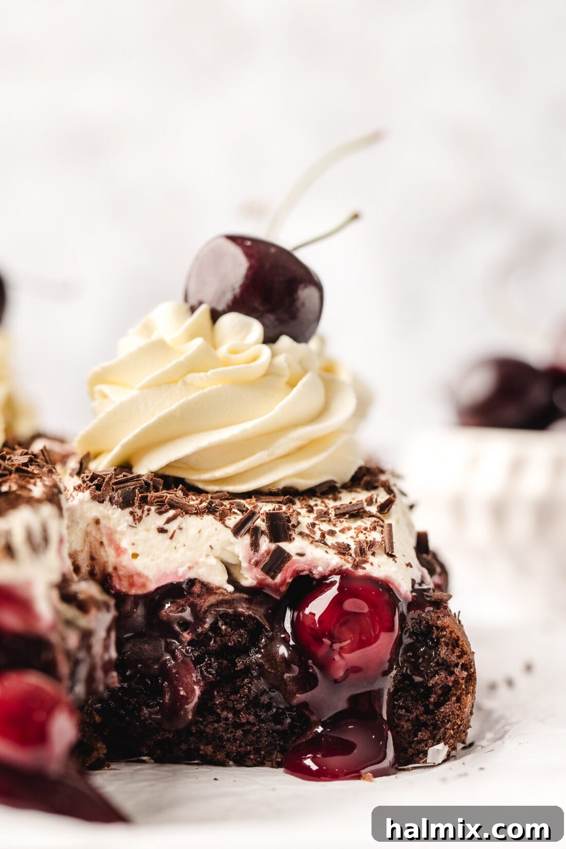 Decadent Black Forest Poke Cake 2 Piece of Black Forest Poke Cake