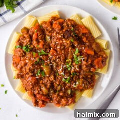 plate of bolognese sauce on pasta