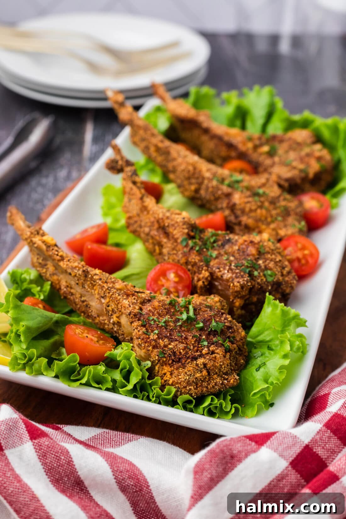 Golden Fried Lamb Perfection 14 Side photo of Fried Lamb Chops resting on a bed of lettuce