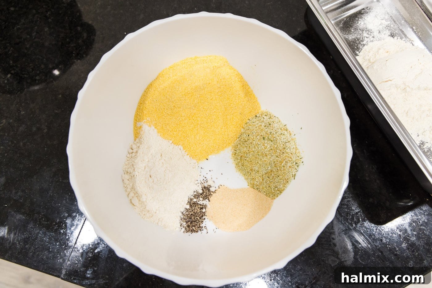 Golden Fried Lamb Perfection 5 fried lamb chop ingredients in a bowl