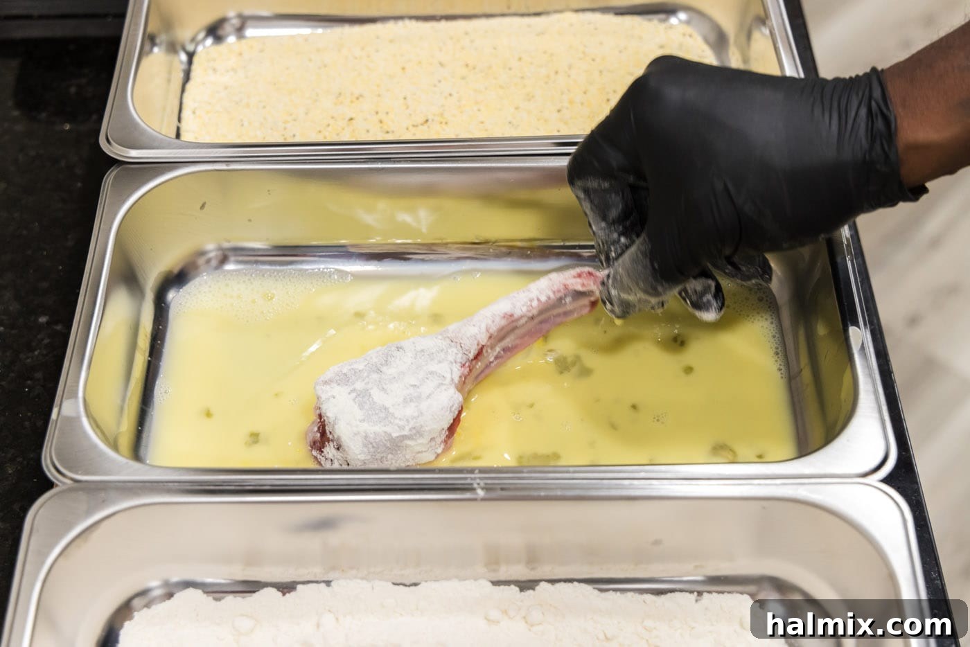 Golden Fried Lamb Perfection 8 dipping lamb chop in egg mixture