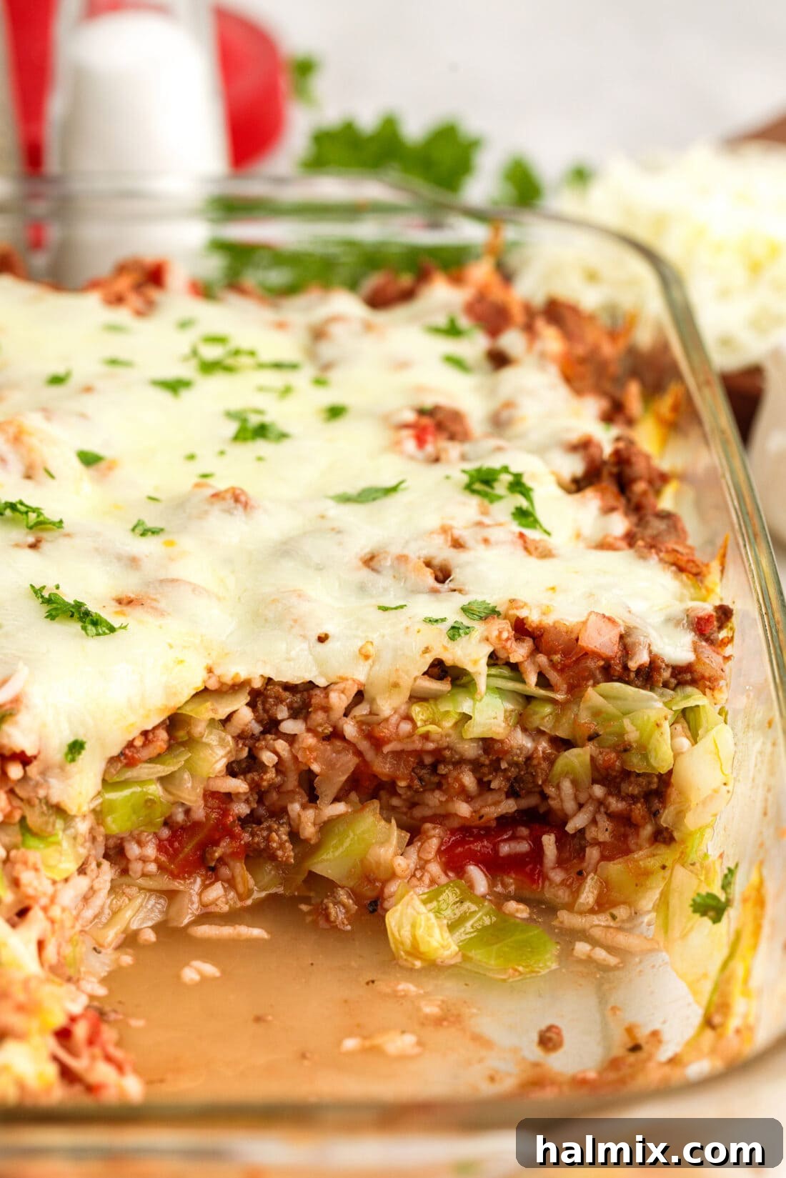 Hearty Unstuffed Cabbage Casserole 3 Pan of Cabbage Roll Casserole with a serving removed