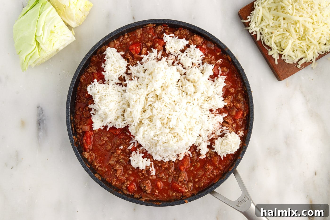 Hearty Unstuffed Cabbage Casserole 9 white rice added to skillet with cabbage roll filling
