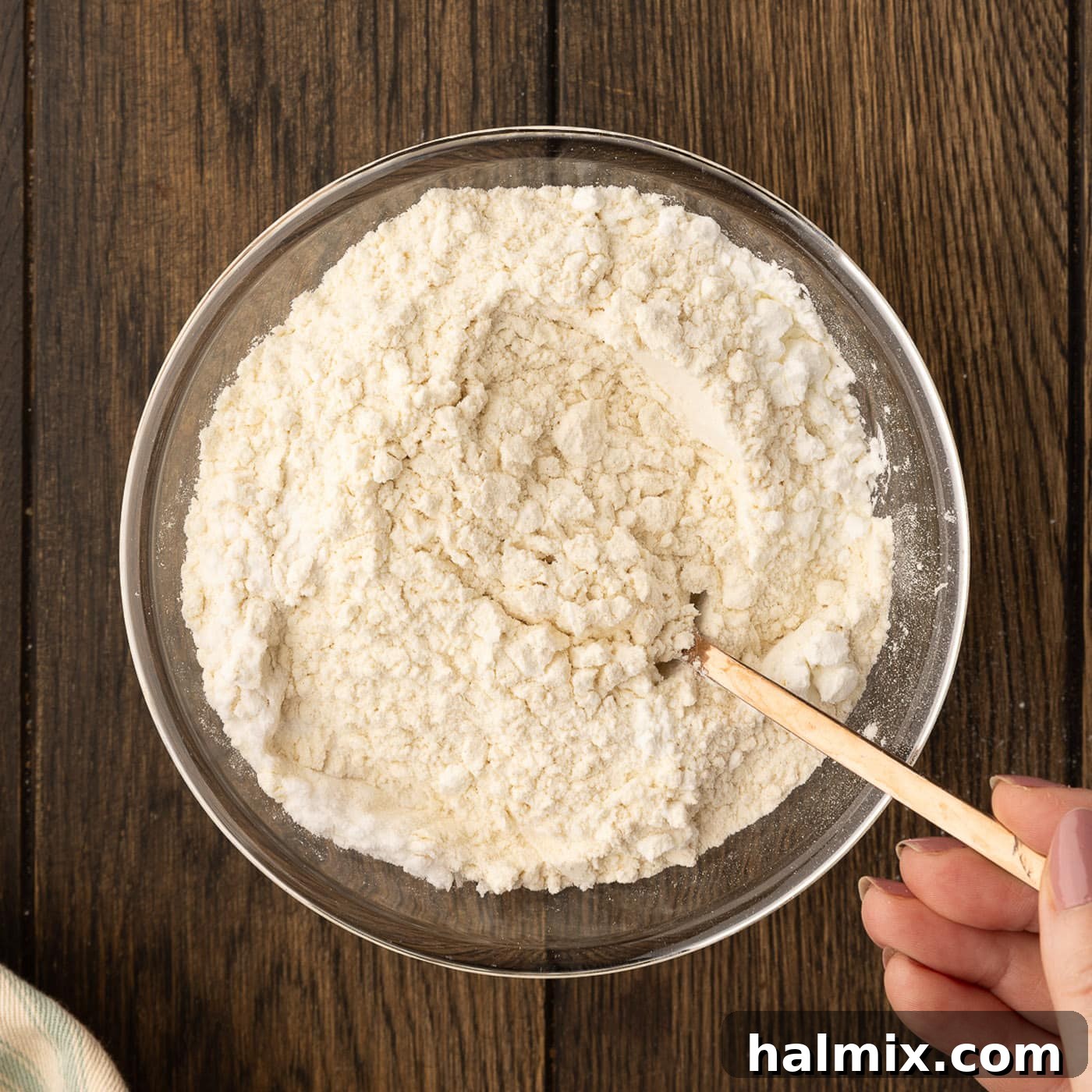 Decadent Caramel Chocolate Skillet 5 mixing dry ingredients for cookie dough in a bowl