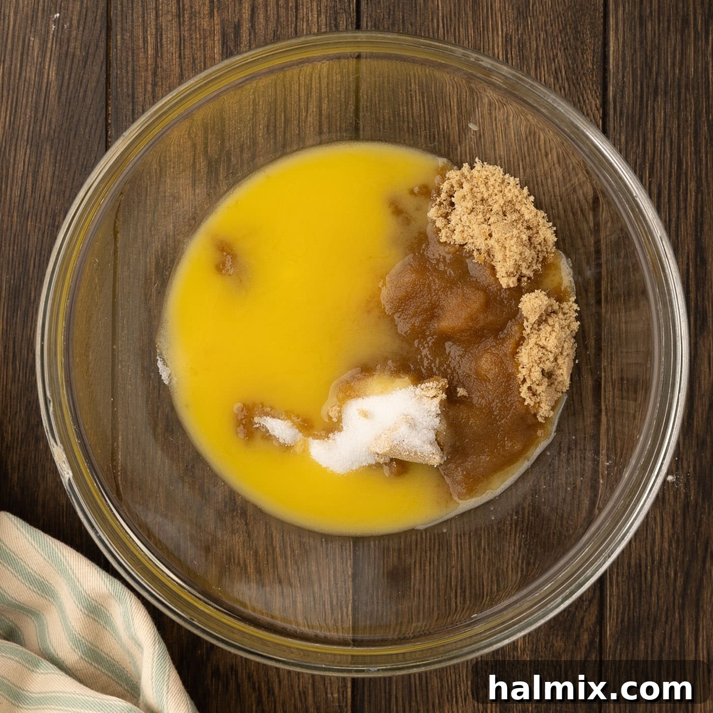 Decadent Caramel Chocolate Skillet 6 mixing wet ingredient for chocolate chip cookies in a bowl