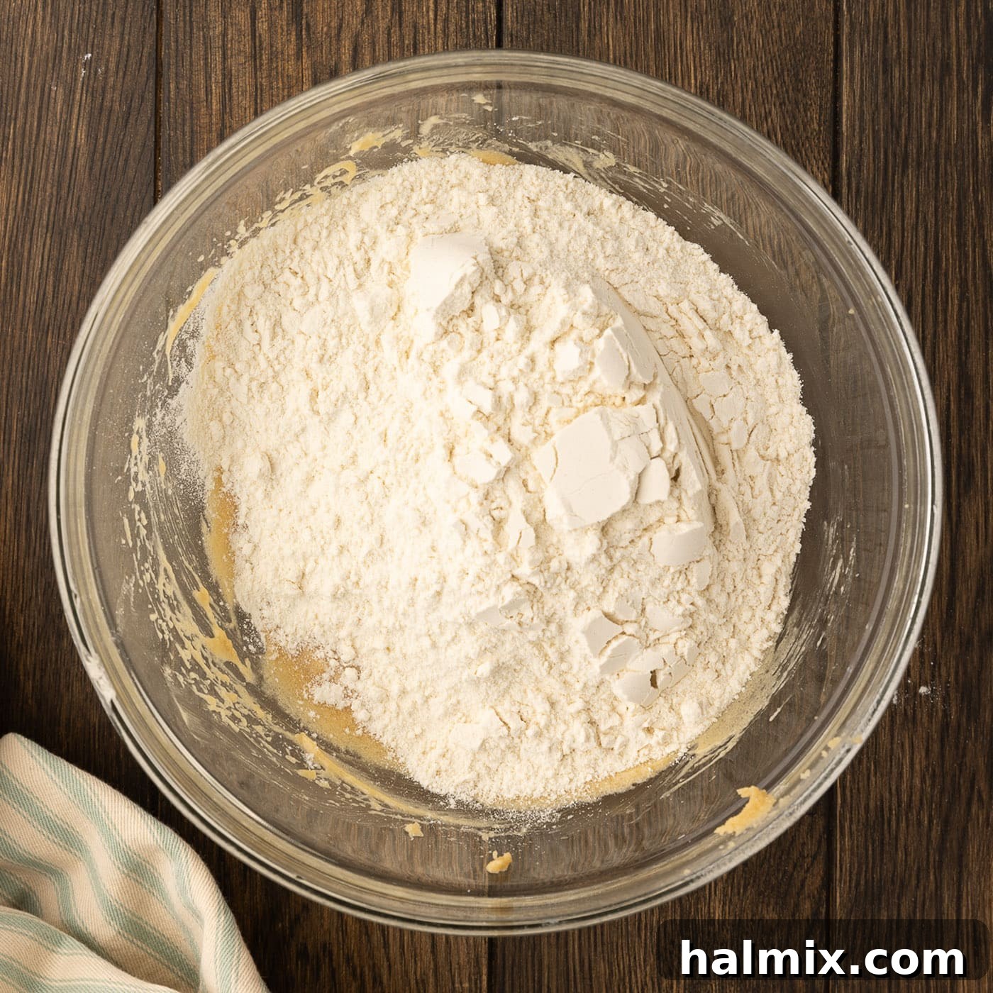 Decadent Caramel Chocolate Skillet 10 adding flour mixture to wet ingredients for cookie dough