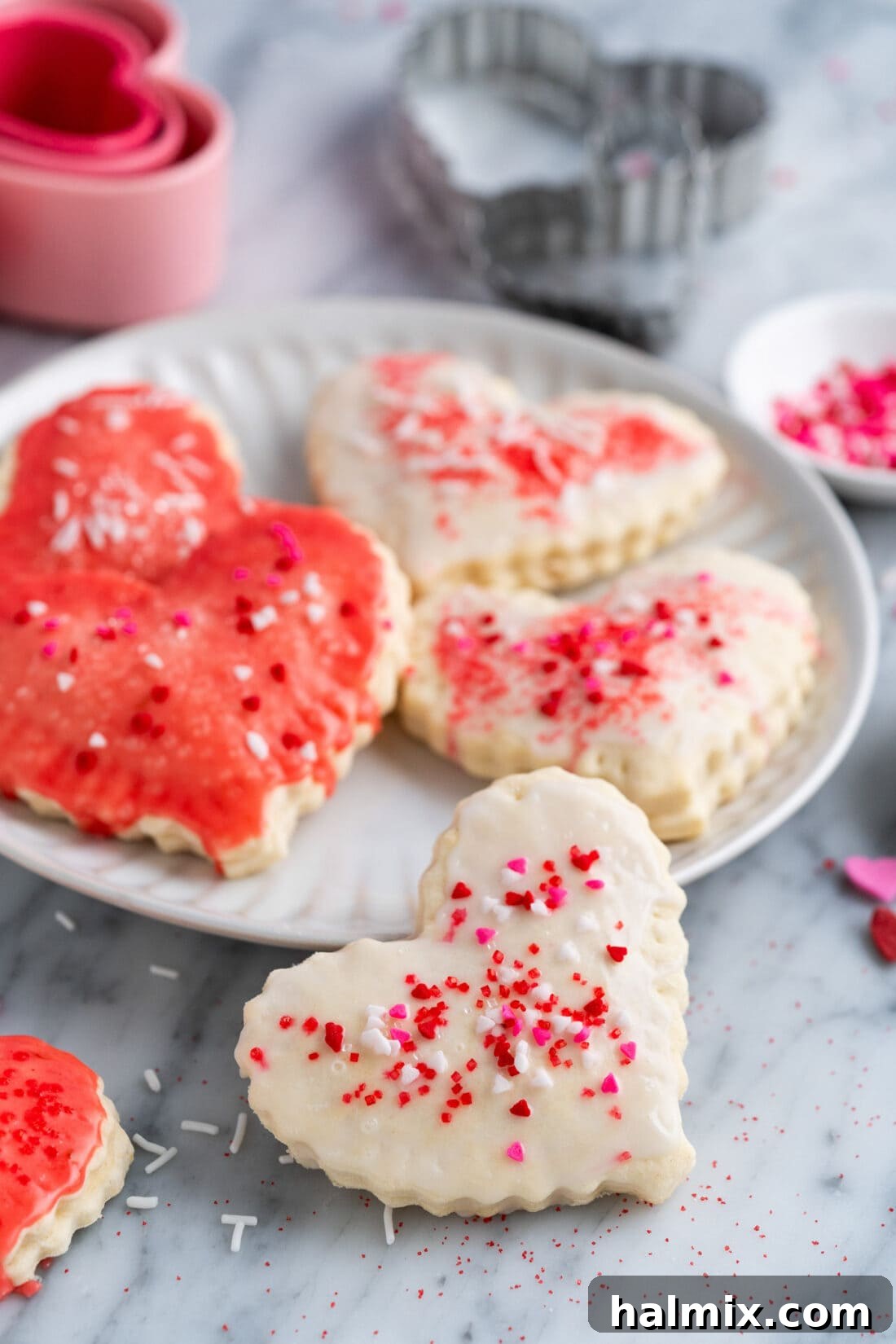Sweetheart Pop Tarts 2 Heart Shaped Pop Tart resting on the side of a plate with more on the plate