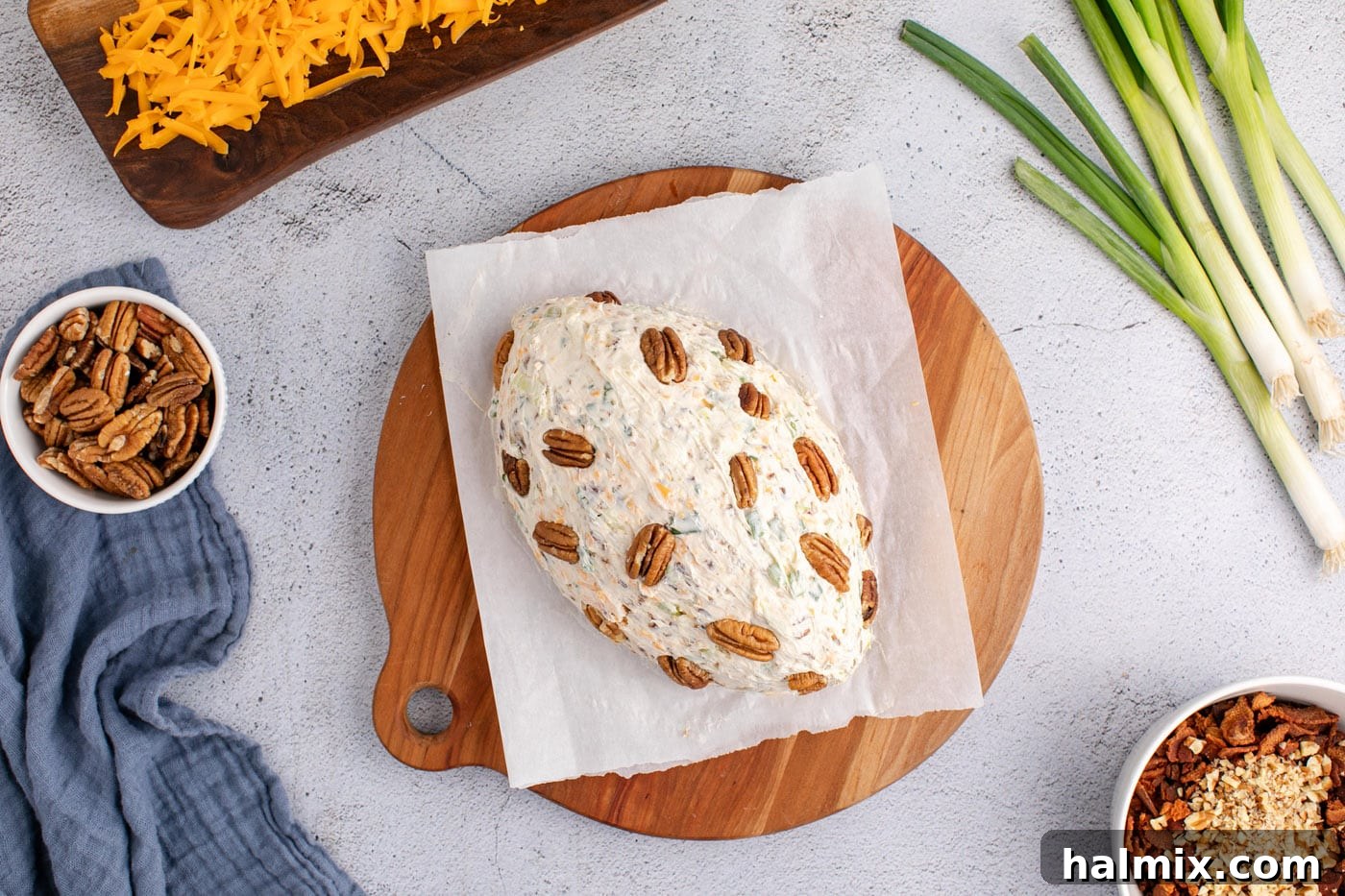 whole pecans added to football cheese ball