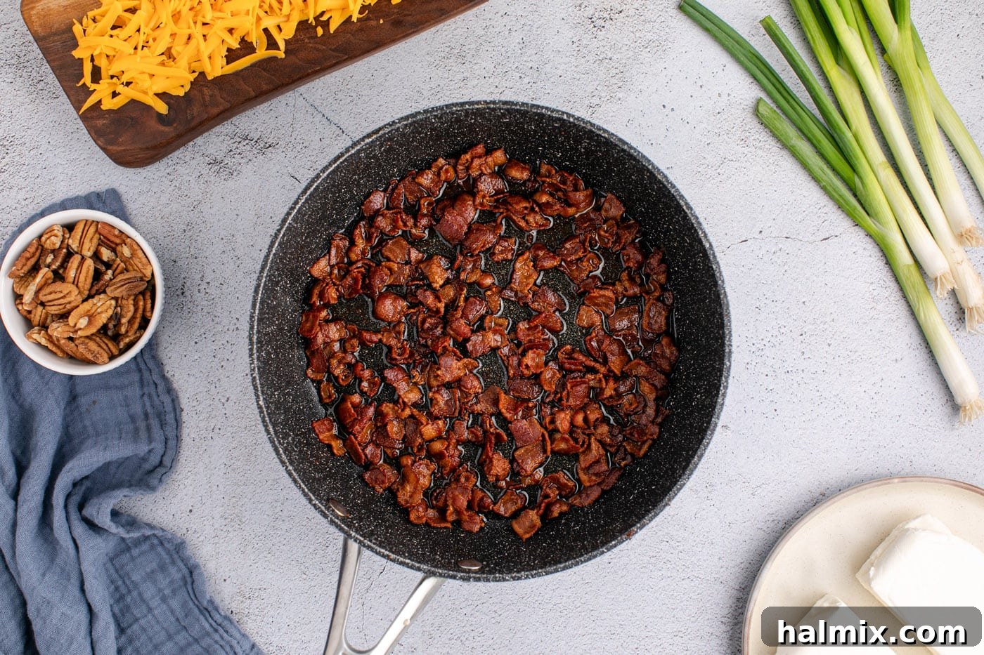 cooked bacon bits in a skillet