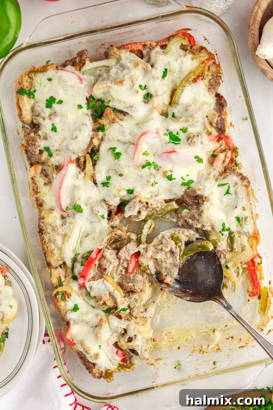 Philly Cheesesteak Casserole with a spoon in it