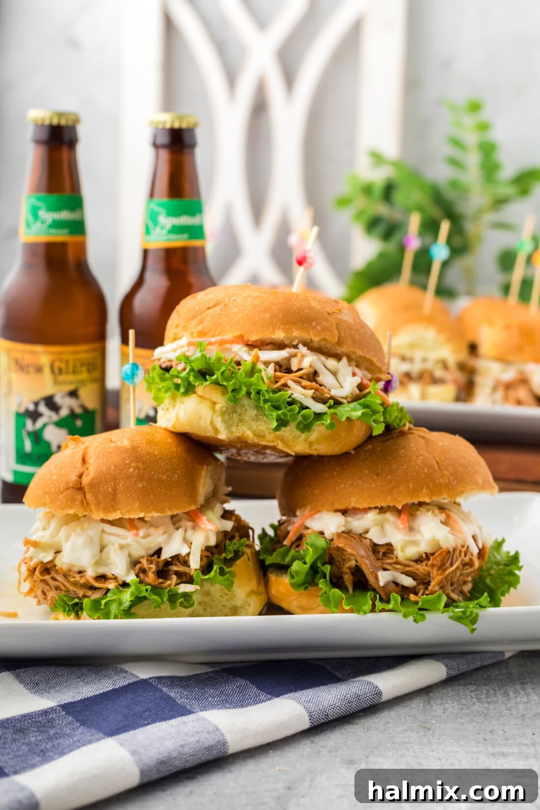 Stack of freshly made BBQ Chicken Sandwiches, ready to be enjoyed.