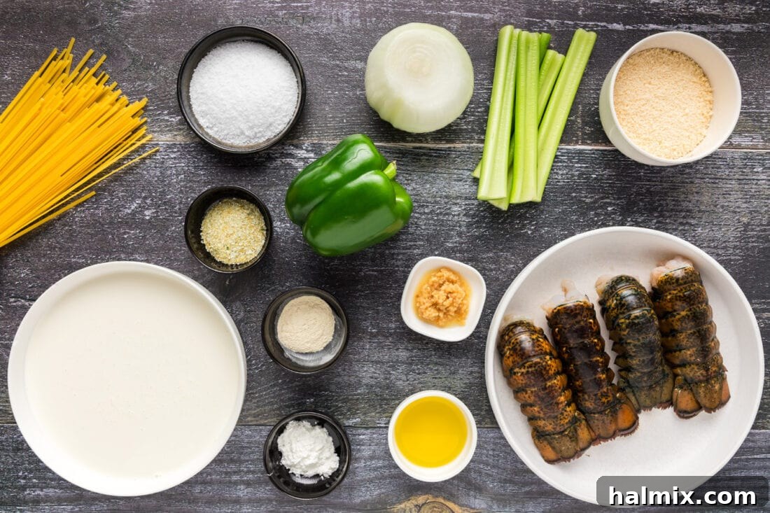 Array of fresh ingredients including lobster tails, vegetables, and cream for making lobster pasta