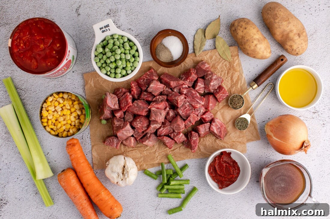 Various fresh ingredients laid out for making Vegetable Beef Soup