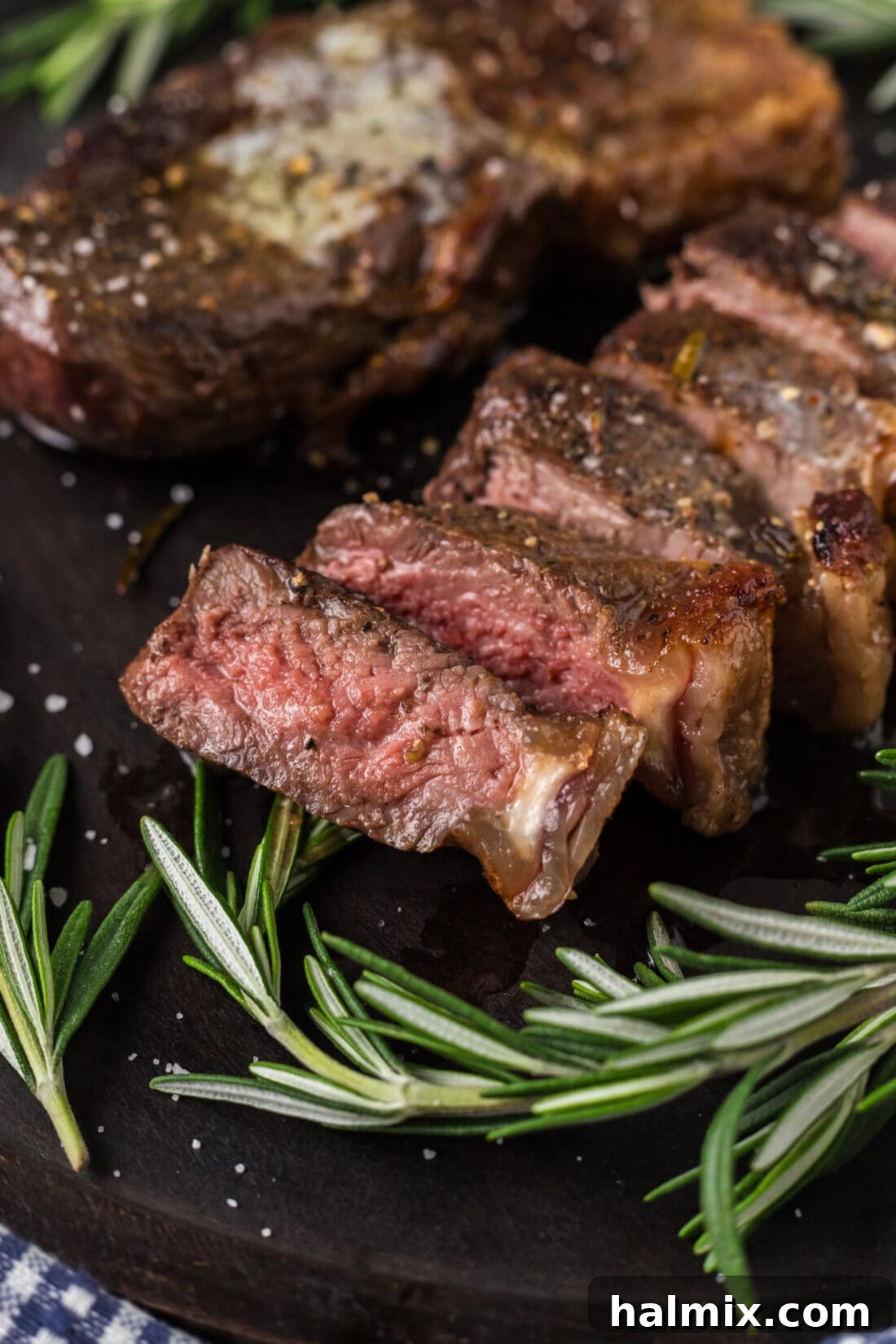 Close up photo of a perfectly sliced Sous Vide Steak, showing its even pink center and juicy texture