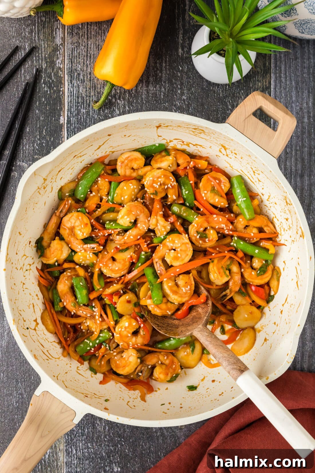 Sweet Chili Shrimp Stir-Fry 2 Shrimp Stir Fry in a skillet with a spoon