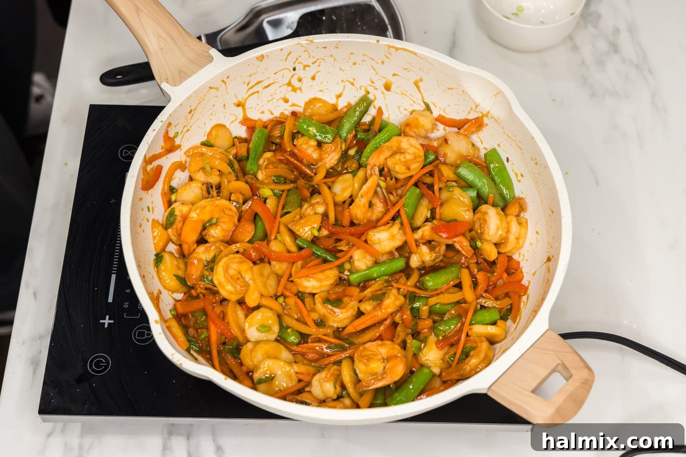 easy shrimp stir fry in a skillet