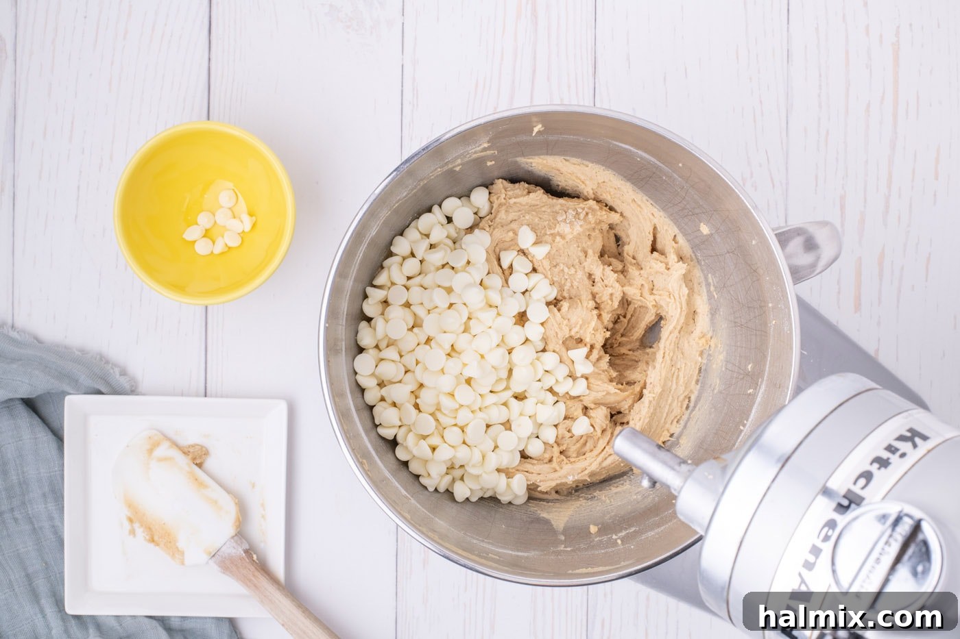 Golden Delights 10 white chocolate chips in bowl of browned butter blondie batter