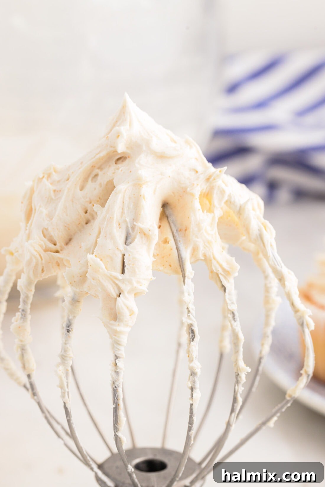 Brown Butter Cream Cheese Frosting 3 Brown Butter Frosting on a mixer whisk attachment