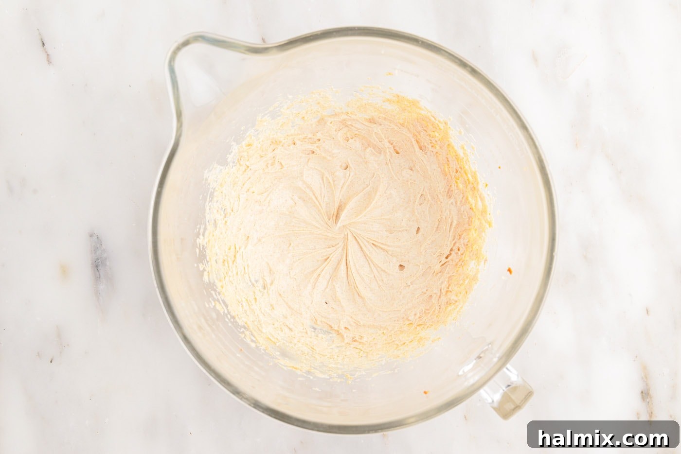 Brown Butter Cream Cheese Frosting 9 whipped brown butter in a bowl