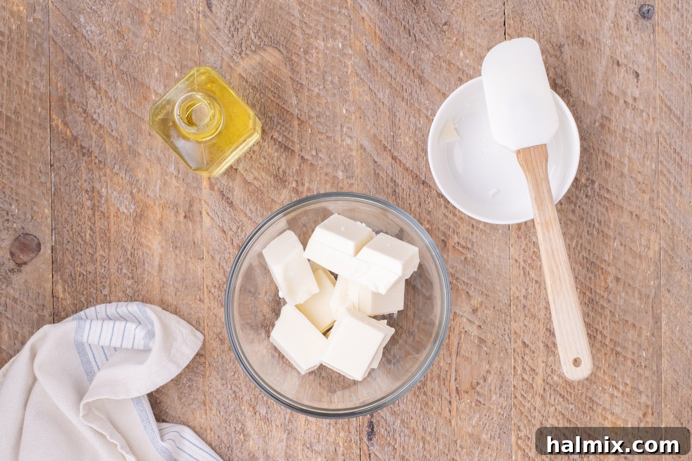 White almond bark squares in a microwave-safe bowl, ready for melting