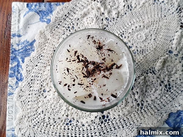 An overhead photo of an Olive Garden Italian cream soda copycat, garnished with chocolate shavings and perfectly chilled.
