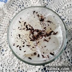 An overhead photo of an Olive Garden Italian cream soda with chocolate shavings on top, ready to be enjoyed.