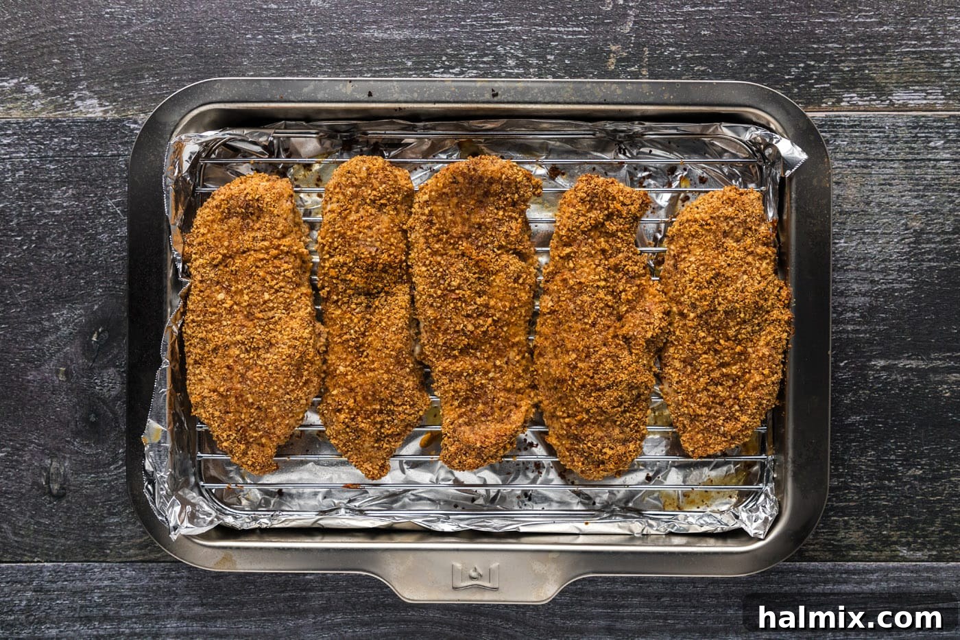 Deliciously baked almond crusted chicken breasts fresh out of the oven.