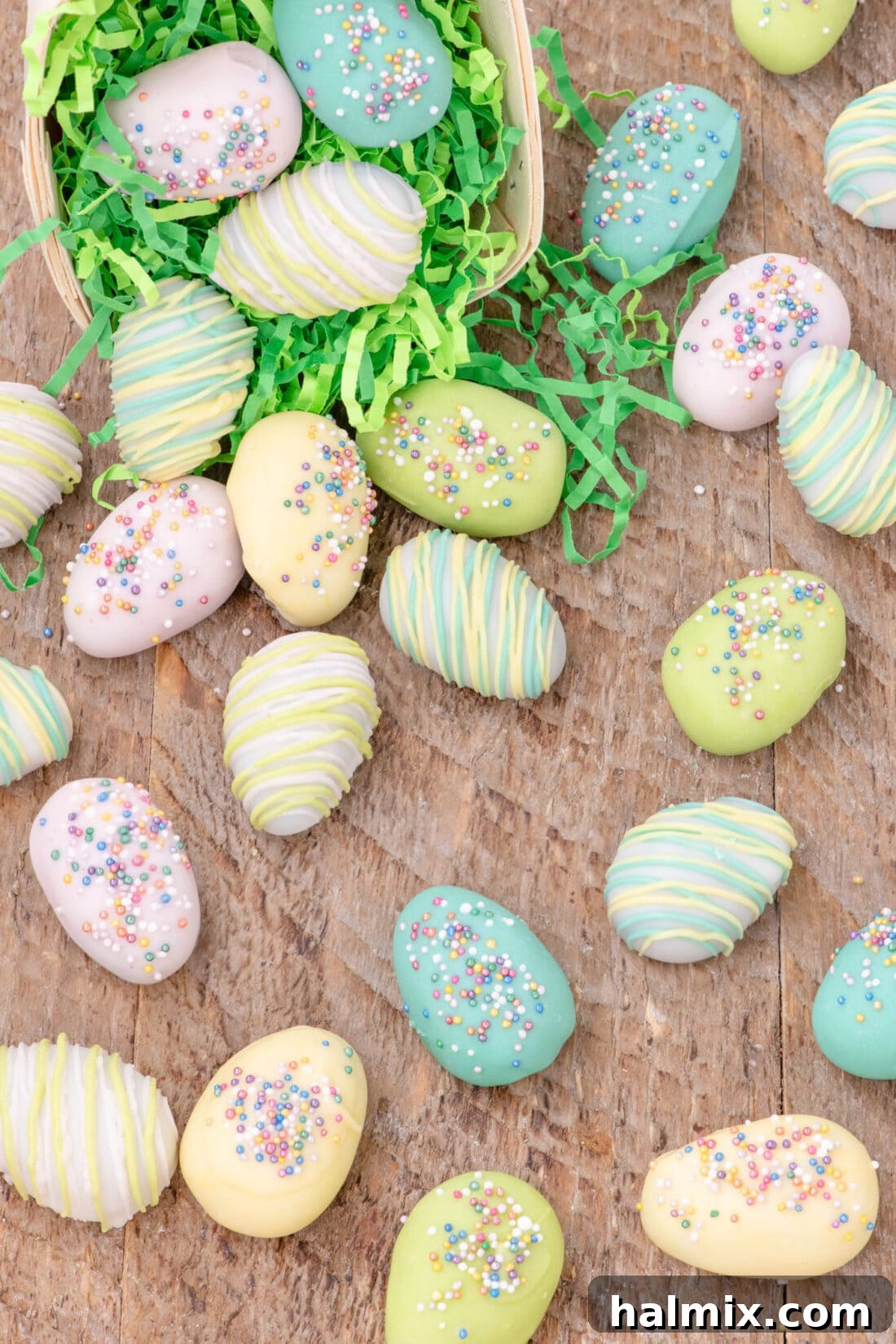 Delightful Easter Egg Oreo Truffles 2 Easter Egg Oreo Truffles sprinkled out of an Easter basket