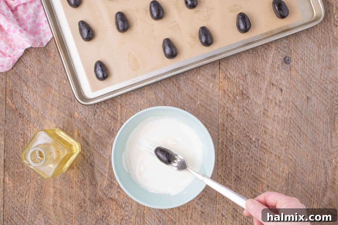 Delightful Easter Egg Oreo Truffles 9 dipping Easter egg Oreo truffles in white chocolate